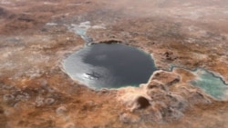This illustration shows Jezero Crater — the landing site of the Mars 2020 Perseverance rover — as it may have looked billions of years go on Mars, when it was a lake. An inlet and outlet are also visible on either side of the lake. (Image Credit: NASA/JPL)