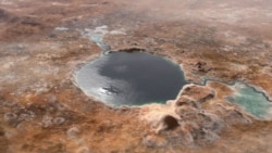 This illustration shows Jezero Crater — the landing site of the Mars 2020 Perseverance rover — as it may have looked billions of years go on Mars, when it was a lake. An inlet and outlet are also visible on either side of the lake. (Image Credit: NASA/JPL