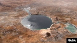 This illustration shows Jezero Crater — the landing site of the Mars 2020 Perseverance rover — as it may have looked billions of years go on Mars, when it was a lake. An inlet and outlet are also visible on either side of the lake. (Image Credit: NASA/JPL