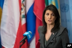 FILE - U.S. Ambassador to the United Nations Nikki Haley speaks to reporters, Jan. 2, 2018, at U.N. headquarters. She said the "civilized world" must remain vigilant against North Korean weapons development. "We will never accept a nuclear North Korea."