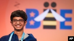 Karthik Nemmani, 14, from McKinney, Texas, smiles after winning the Scripps National Spelling Bee in Oxon Hill, Md., Thursday, May 31, 2018. (AP Photo/Cliff Owen) 