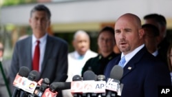 Ronald Hopper, FBI assistant special agent in charge, right, speaks during a news conference with updates about the recent mass shooting at the Pulse nightclub, Monday, June 20, 2016, in Orlando, Fla. (AP Photo/John Raoux)