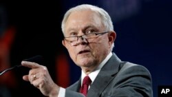 FILE - U.S. Attorney General Jeff Sessions makes a point during his speech at the Western Conservative Summit in Denver, June 8, 2018.