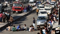 People block Chandigarh Shimla highway in Panchkula in Haryana state, India, Feb. 21, 2016, as thousands of members of an underprivileged community in northern India continue to protest to demand government benefits and jobs