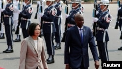 Taiwan's President Tsai Ing-wen and Haiti's President Jovenel Moise review the honour guard at a welcoming ceremony, in Taipei, Taiwan May 29, 2017. Seventeen countries have diplomatic relations with Taiwan.