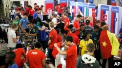 Students from around the world — from Peru to Russia to Slovenia and from across Africa — meet during the FIRST Global Robotics Challenge, July 18, 2017, in Washington. The challenge is an international robotics event with teams from over 100 countries.