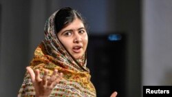 FILE - Malala Yousafzai of Pakistan speaks at the World's Children's Prize ceremony in Mariefred, Sweden, Oct. 29, 2014.