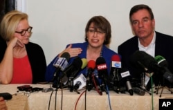 From left, U.S. Sens. Claire McCaskill of Missouri, Amy Klobuchar of Minnesota and Mark Warner of Virginia speak to reporters during a visit to Cuba in support of a bill aimed at lifting the U.S. trade embargo on the island nation, Feb. 17, 2015.