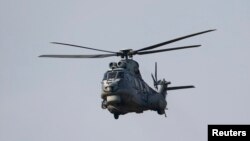 A Turkish Air Force AS-532AL Cougar helicopter takes off from Incirlik airbase in the southern city of Adana, Turkey, July 27, 2015. Kurdish fighters in northern Syria accused the Turkish army of shelling their positions on Monday.