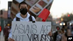 示威者在洛杉磯參加"熱愛我們的社區"集會,反對針對亞裔美國人的暴力。(2021年3月13日)