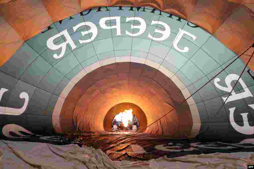 The Jeeper balloon, a prototype of an ecological balloon, created on the initiative of the club &quot;Les Aeronautes de Monaco,&quot; is being inflated before taking off from the square in front of the Prince&#39;s Palace of Monaco in Monaco for a five-hour flight, as part of the &quot;Next Generation Project.&quot;