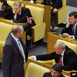 Lawmakers vote on the New Strategic Arms Reduction Treaty (START) in the Russian lower house, the State Duma, in Moscow , 24 Dec 2010