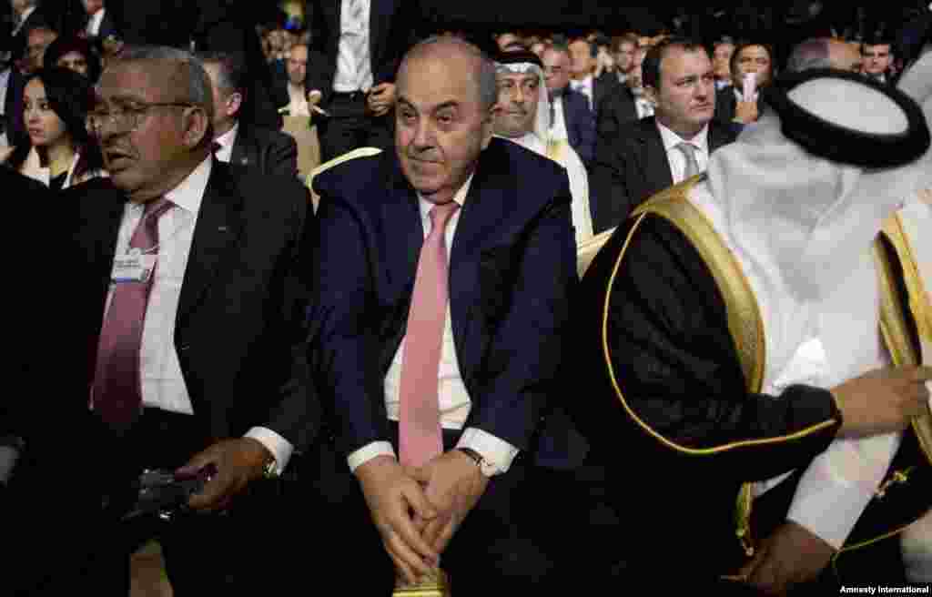 Iraq's Vice President Iyad Allawi, center, attends the opening session of the World Economic Forum at the King Hussein convention center, Southern Shuneh, Jordan, May 22, 2015. 