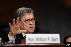 FILE - Attorney General William Barr testifies before the Senate Judiciary Committee on Capitol Hill in Washington, May 1, 2019.