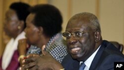 FAO (Food and Agriculture Organization of the United Nations) Director General Jacques Diouf (R) speaks during a meeting in Rome about the famine crisis in the Horn of Africa August 18, 2011