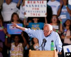 FILE - Democratic presidential candidate Sen. Bernie Sanders, of Vermont, gestures during a campaign event in Tucson, Ariz., Oct. 9, 2015.