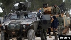 Turkish forces and members of the Free Syrian Army are seen on the outskirts of al-Bab, Feb. 4, 2017.