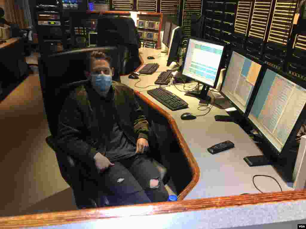 VOA&#39;s AJ Wilder taking a break in the radio studios.