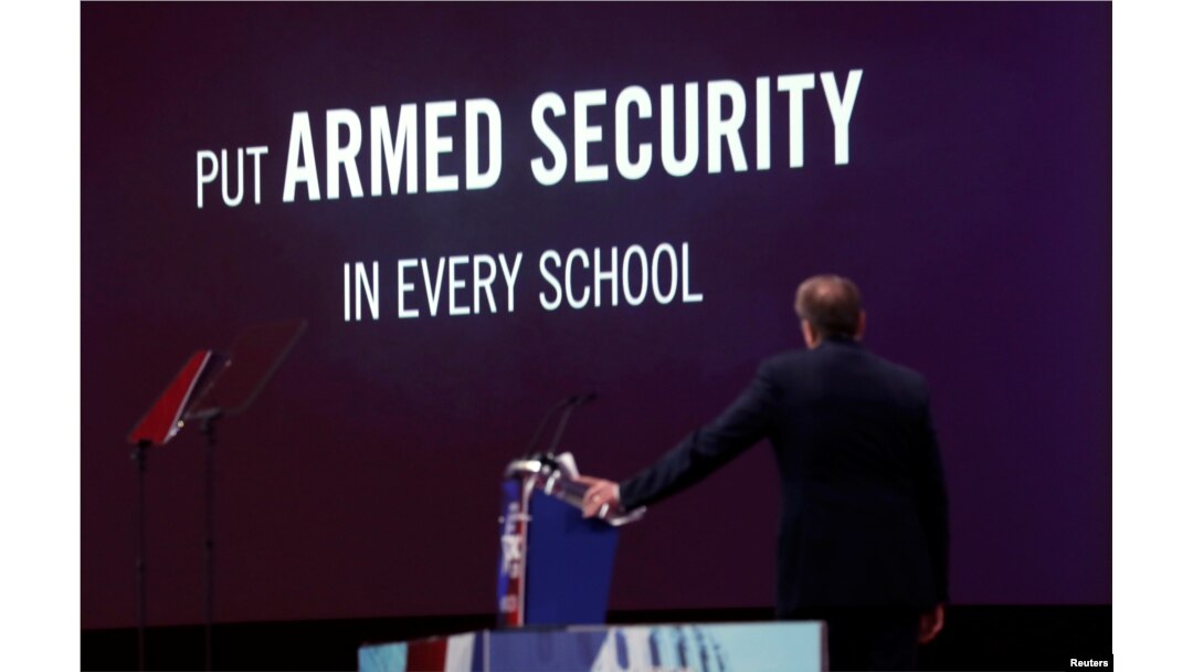 NRA Executive Vice President and CEO Wayne LaPierre watches an NRA promotional video while speaking at the Conservative Political Action Conference (CPAC) at National Harbor, Maryland, Feb. 22, 2018.