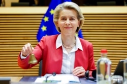 President of the European Commission Ursula von der Leyen rings the bell at the beginning of the College of Commissioners in Brussels, Dec 1, 2021.