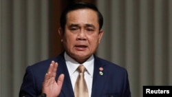 Thai Prime Minister Prayuth Chan-Ocha requests the king to end martial law.
