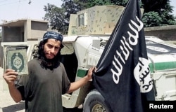 An undated photograph of a man described as Abdelhamid Abaaoud that was published in the Islamic State's online magazine Dabiq and posted on a social media website.