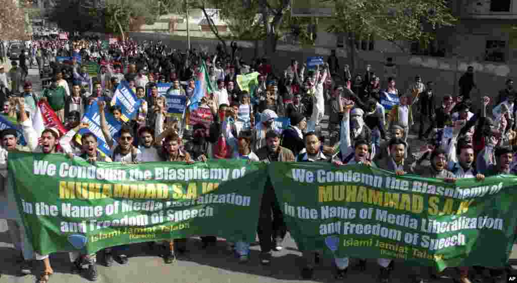 Supporters of Pakistani religious group Jamaat-i-Islami protest caricatures published in French magazine Charlie Hebdo, in Karachi, Pakistan, Jan. 16, 2015.