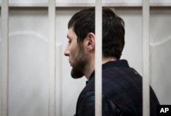 Zaur Dadayev, one of five Nemtsov murder suspects stands in court in Moscow on March 8, 2015.