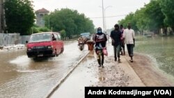 A main road in Chad's capital, Ndjamena, is flooded due to rainfall