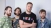 Members of Imagine Dragons, from left, Daniel Platzman, Wayne Sermon, Dan Reynolds and Ben McKee are seen in New York, June 20, 2017.