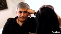 FILE - Human rights activists, Nabeel Rajab (L) talks with Zainab al-Khawaja (R) after al-Khawaja's release from prison, Manama, Bahrain, June 3, 2016. 