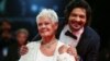 Actors Ali Fazal and Judi Dench pose during a red carpet for the movie "Victoria and Abdul" at the 74th Venice Film Festival in Venice, Italy, Sept. 3, 2017.