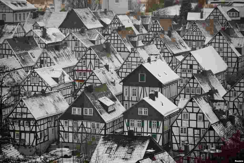 Snow covers the roofs of the so-called &quot;Alter Flecken&quot; (old spot), the historic core of downtown Freudenberg with its half-timbered houses from the 17th century in the heart of the federal state of North Rhine-Westphalia near the city of Siegen, Germany.