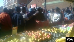 Vendors captured Wednesday after they were evicted from the Harare central business district.