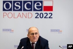 The designated OSCE Chairman-in-Office and Minister of Foreign Affairs of Poland, Zbigniew Rau, speaks during a news conference in Vienna, Austria, , Jan. 13, 2022.
