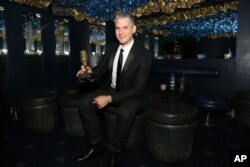 FILE - Paul Epworth, winner of the Best Producer award, is seen at the Music Producers Guild Awards 2013 at the Cafe De Paris in London, Feb. 7, 2013.