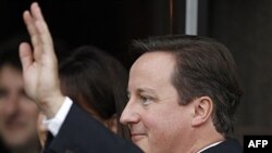 Thủ tướng Anh David Cameron đến Hội nghị thường niên của đảng Bảo thủ đương quyền ở Manchester, 02/10/2011
