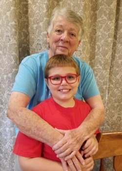 Pat Fry, a retired eighth-grade science teacher, manages her grandson's online schooling. (Photo: Renee Fry via AP)