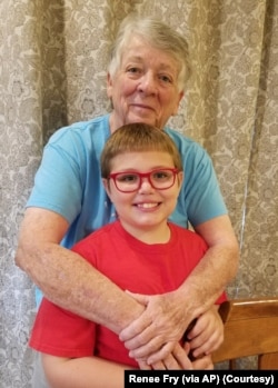 Pat Fry, a retired eighth-grade science teacher, manages her grandson's online schooling. (Photo: Renee Fry via AP)