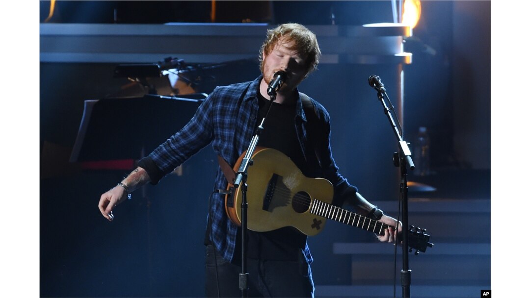 FILE - Ed Sheeran performs at "Stevie Wonder: Songs in the Key of Life - An All-Star Grammy Salute," at the Nokia Theatre L.A. Live on Feb. 10, 2015, in Los Angeles.