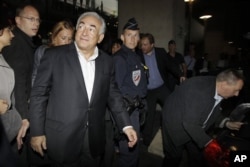លោក ​Dominique Strauss-Kahn, អតីត​ប្រធាន​មូលនិធិ​រូបីវត្ថុ​អន្តរជាតិ​ (IMF) ។​