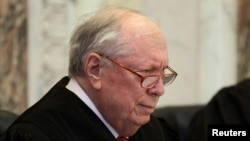 FILE - Judge Stephen Reinhardt listens to arguments during hearing on California's Proposition 8 at the 9th District Court of Appeals in San Francisco.