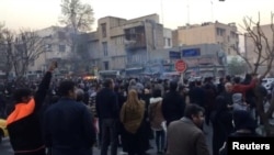 People protest in Tehran, Iran, Dec. 30, 2017, in this still image from a video obtained by Reuters.