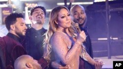Mariah Carey performs at the New Year's Eve celebration in Times Square, Dec. 31, 2016, in New York.