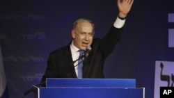 Israel's Prime Minister Benjamin Netanyahu greets his supporters in Tel Aviv, Israel, Jan. 23, 2013
