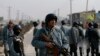 At Least 100 Afghan Police Defect to Taliban