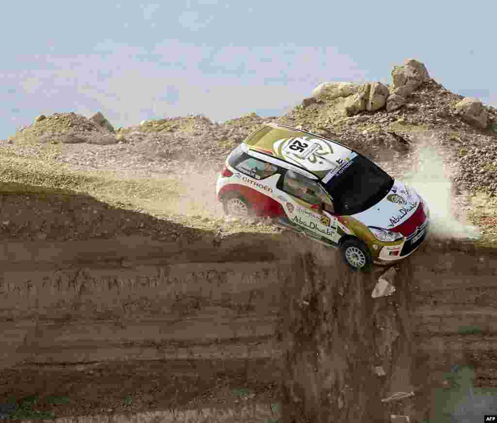Abu Dhabi Racing&#39;s Emirati driver Mohammed al-Sahlawi and his Irish co-driver Allan Harryman veer off a cliff during the first stage of the Jordan Rally, round three of the FIA Middle East Rally Championship, in Sweimeh near the Dead Sea. The drivers escaped unhurt. (Ho/Jordan Rally photo)