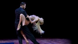 Kirill Parshakov and Anna Gudyno, from Russia, compete in the stage category at the World Tango Championship final in Buenos Aires, Argentina, Thursday, Aug. 27, 2015. (AP Photo/Natacha Pisarenko)