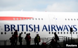 FILE - British Airways' new Airbus A380 arrives at a hanger after landing at Heathrow airport in London July 4, 2013.