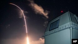 FILE - This Dec. 10, 2018, photo provided by the U.S. Missile Defense Agency (MDA) shows the launch of the U.S. military's land-based Aegis missile defense testing system.